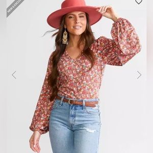 Super cute women’s Buckle - Daytrip- bodysuit.